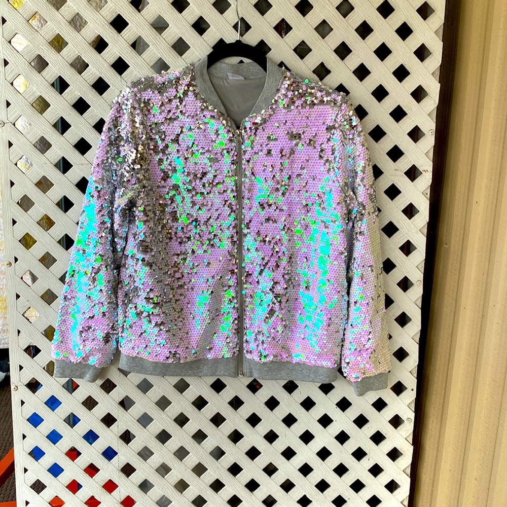 Beautiful Silver sequined jacket, size 18. Brand Wonder Woman.